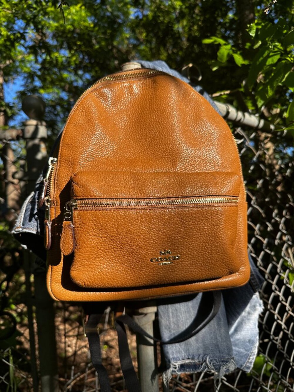 Coach brown pebble leather with gold hardware backpack